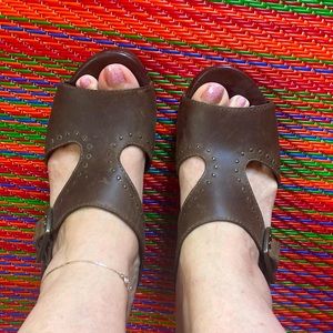 Dansko dark brown high heeled wedge.  Like new.